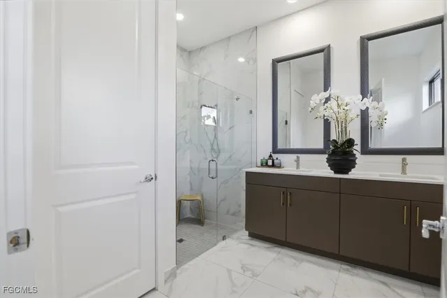 a building outdoor space with patio furniture and potted plants