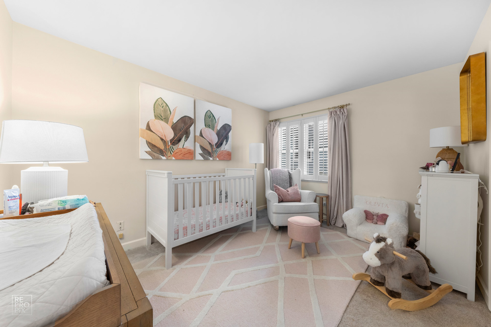 536 West Evergreen Street Wheaton, IL 60187 - Photo 21 of 27 a bedroom with furniture and a window