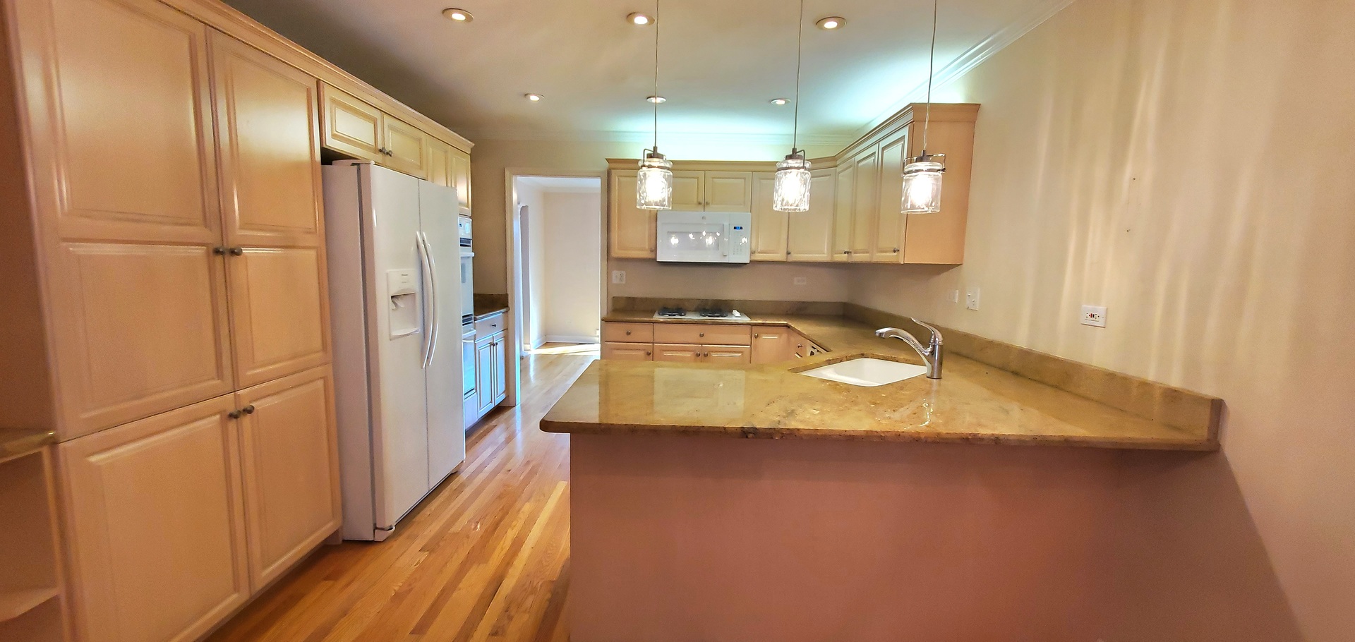 536 West Evergreen Street Wheaton, IL 60187 - Photo 4 of 27 a bathroom with a granite countertop sink a mirror and shower