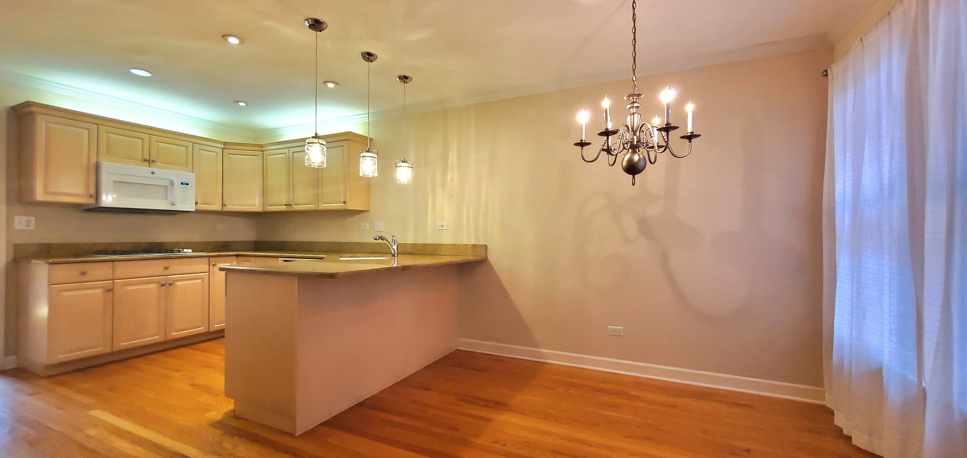 536 West Evergreen Street Wheaton, IL 60187 - Photo 6 of 27 a large kitchen with stainless steel appliances granite countertop a lot of counter space and a sink