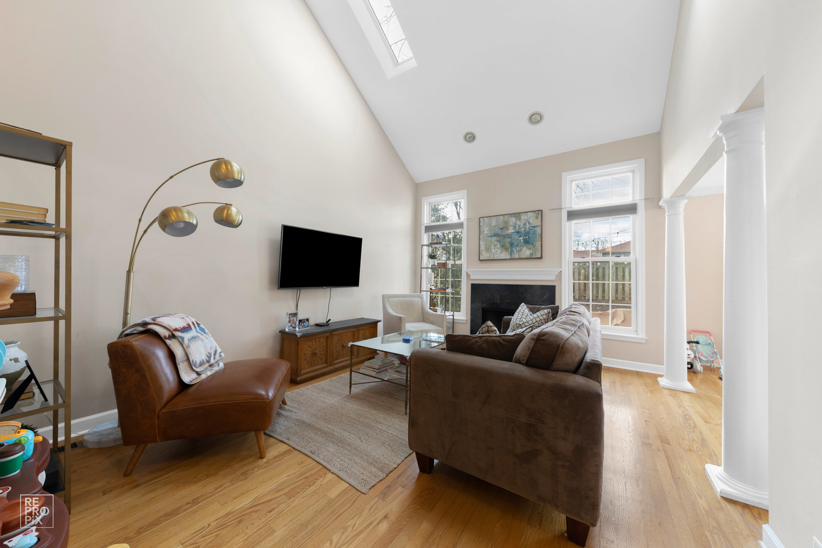 536 West Evergreen Street Wheaton, IL 60187 - Photo 8 of 27 a living room with furniture and a flat screen tv