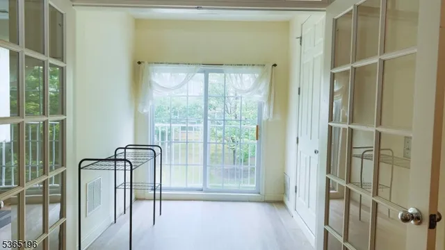 a view of a bathroom with a glass door