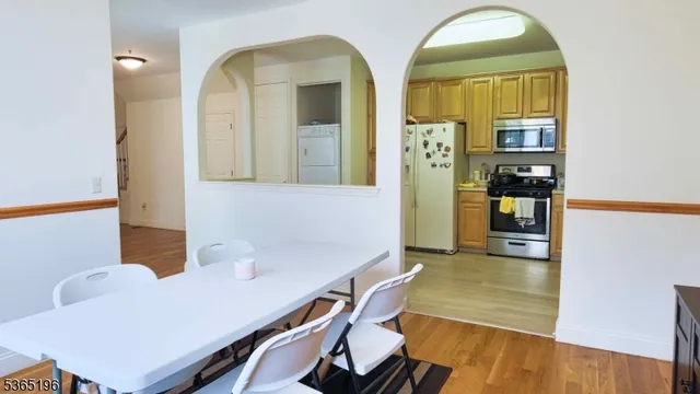 a view of hall way with furniture