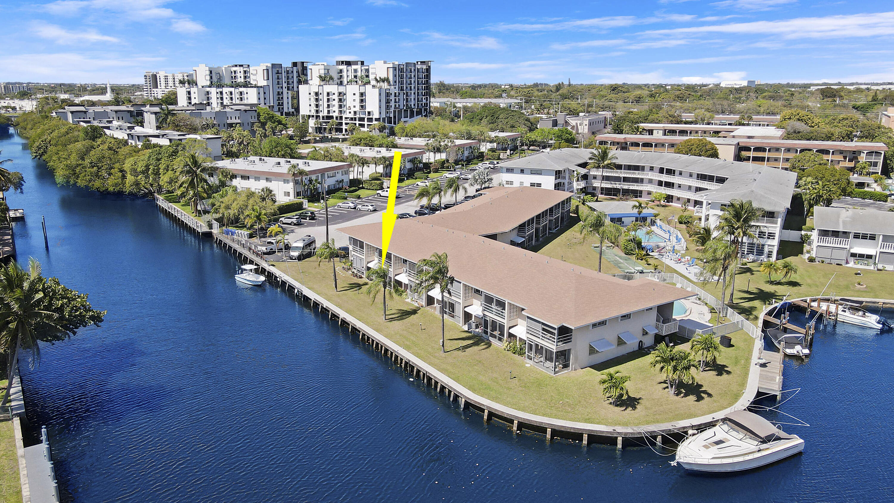 298 Southeast 6th Avenue, Unit 6 Pompano Beach, FL 33060 - Photo 36 of 36 a view of a swimming pool with chairs