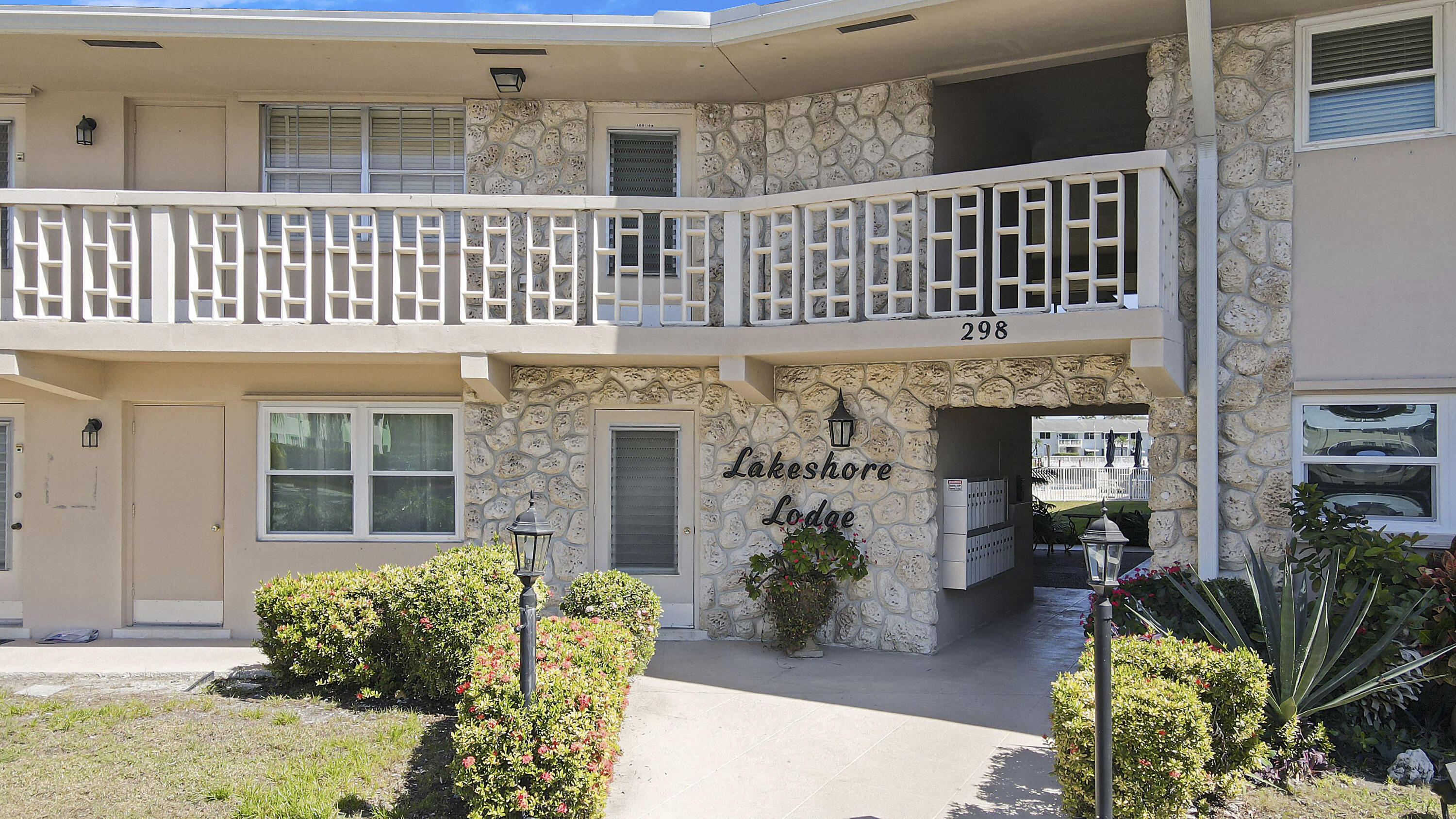 298 Southeast 6th Avenue, Unit 6 Pompano Beach, FL 33060 - Photo 5 of 36 front view of a house with a potted plant