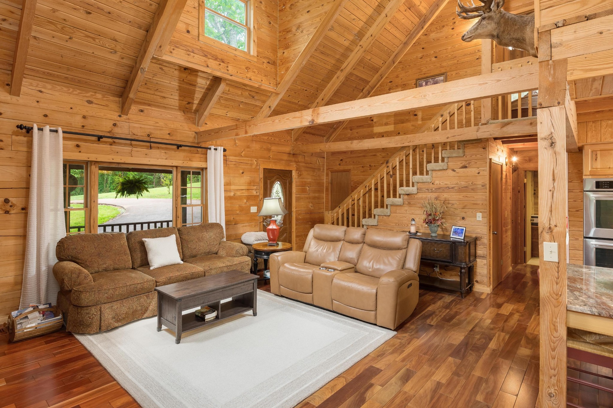 6435 Davis Hill Road Birchwood, TN 37308 - Photo 22 of 64 a living room with furniture and a wooden floor