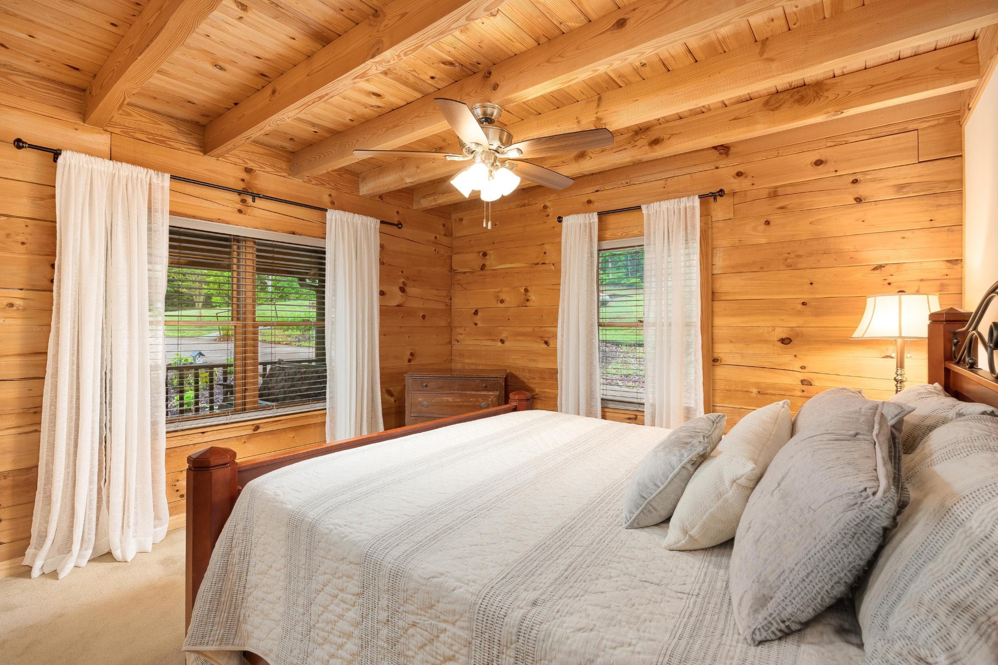 6435 Davis Hill Road Birchwood, TN 37308 - Photo 23 of 64 a bedroom with a large bed and a large window