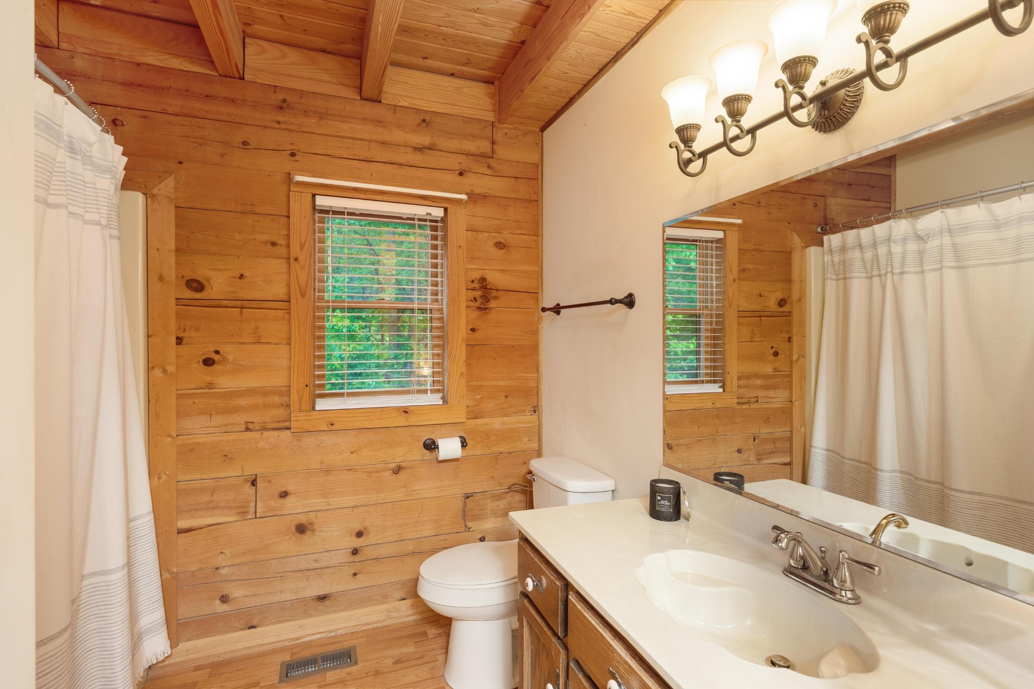 6435 Davis Hill Road Birchwood, TN 37308 - Photo 26 of 64 a bathroom with a sink a toilet and tub