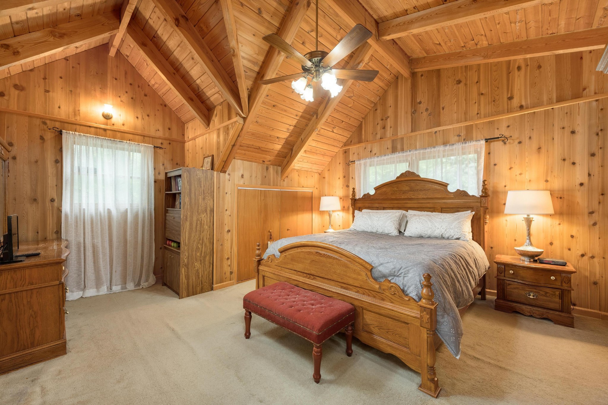 6435 Davis Hill Road Birchwood, TN 37308 - Photo 28 of 64 a bedroom with a bed and a chandelier
