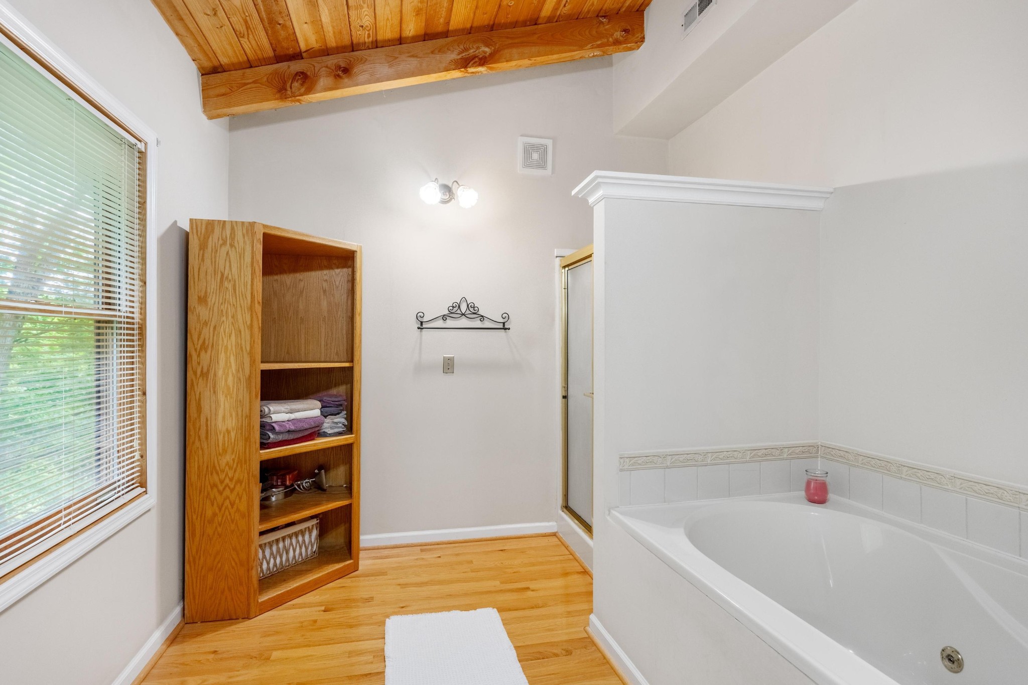 6435 Davis Hill Road Birchwood, TN 37308 - Photo 32 of 64 a bathroom with a tub and a shower