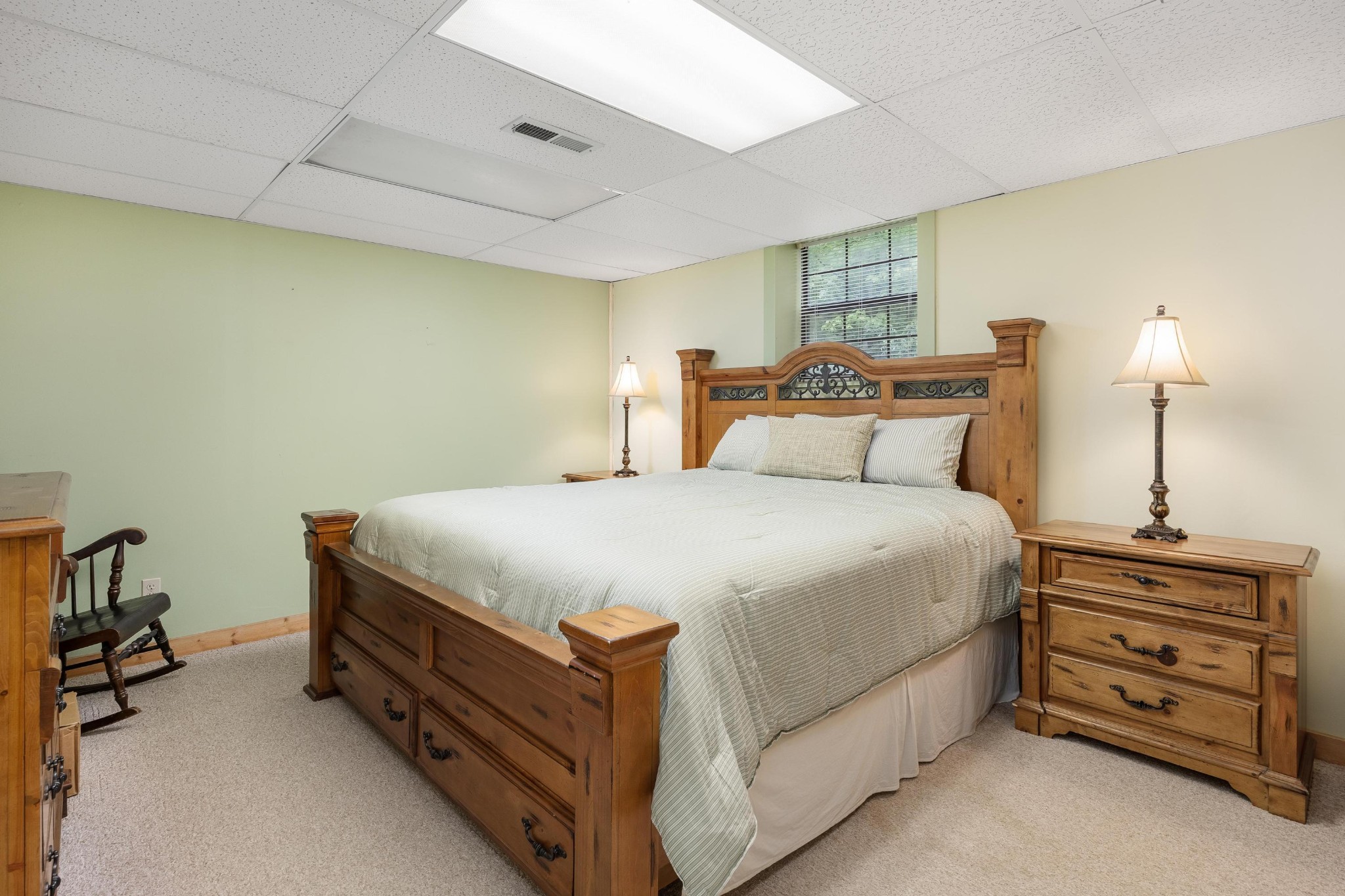 6435 Davis Hill Road Birchwood, TN 37308 - Photo 36 of 64 a bedroom with a bed and a dresser