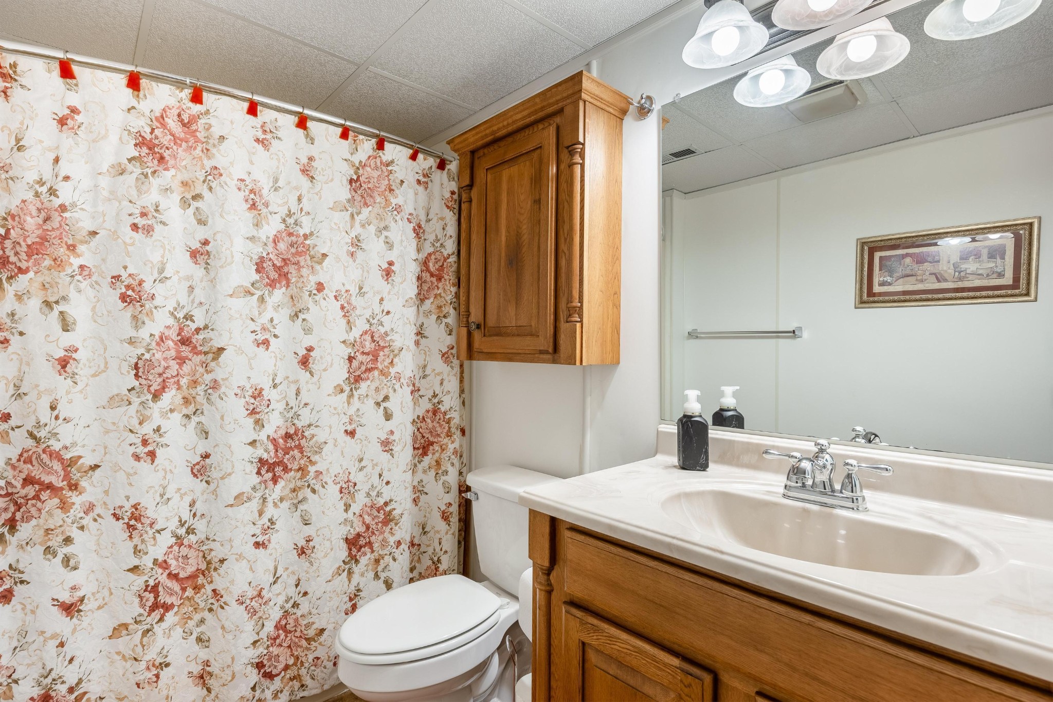 6435 Davis Hill Road Birchwood, TN 37308 - Photo 38 of 64 a bathroom with a sink a toilet and a mirror