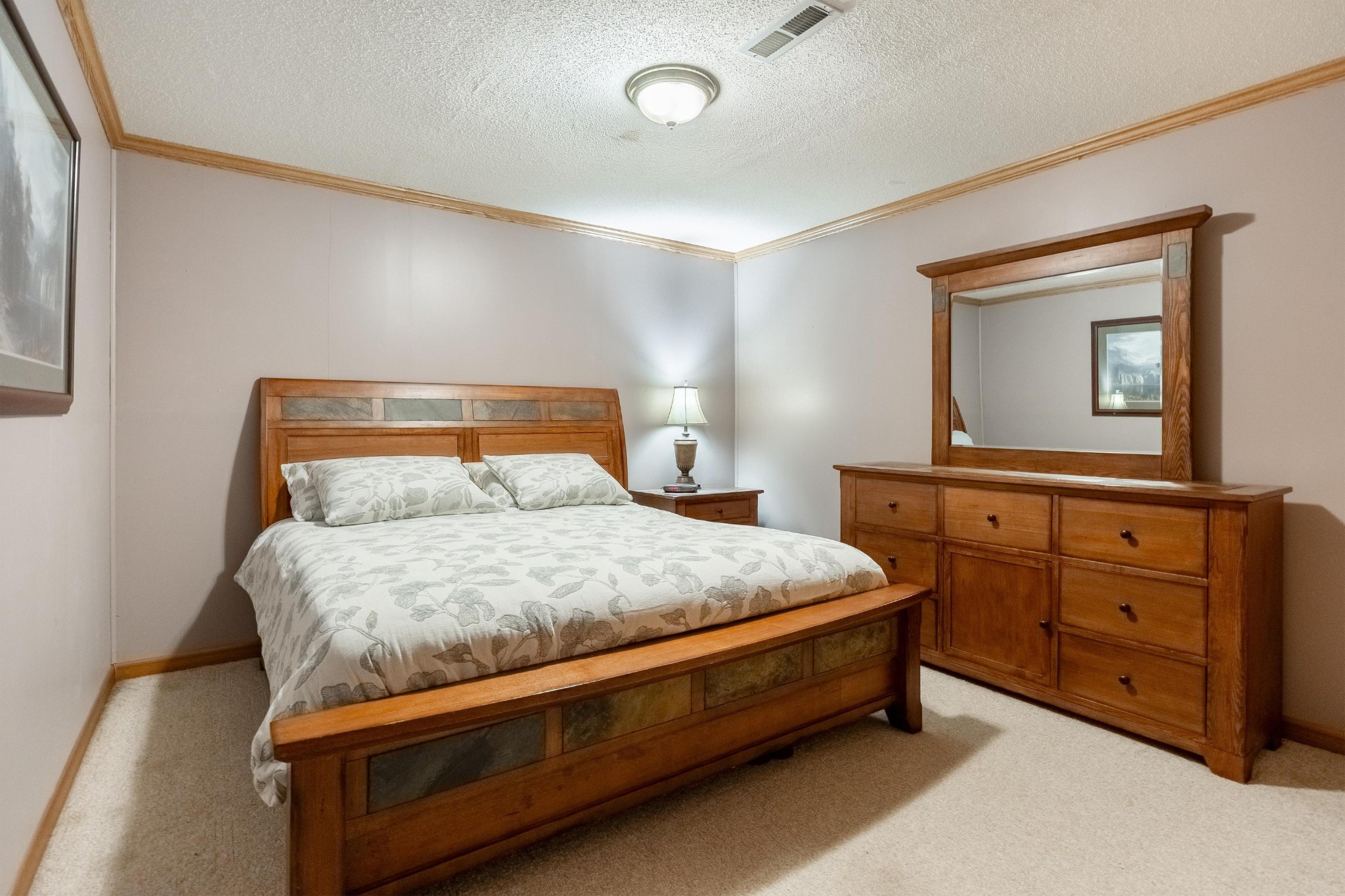 6435 Davis Hill Road Birchwood, TN 37308 - Photo 39 of 64 a bedroom with a bed and a dresser