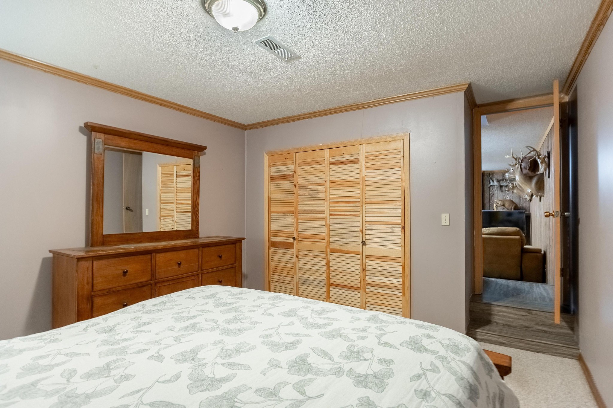 6435 Davis Hill Road Birchwood, TN 37308 - Photo 40 of 64 a bedroom with a bed and a dresser