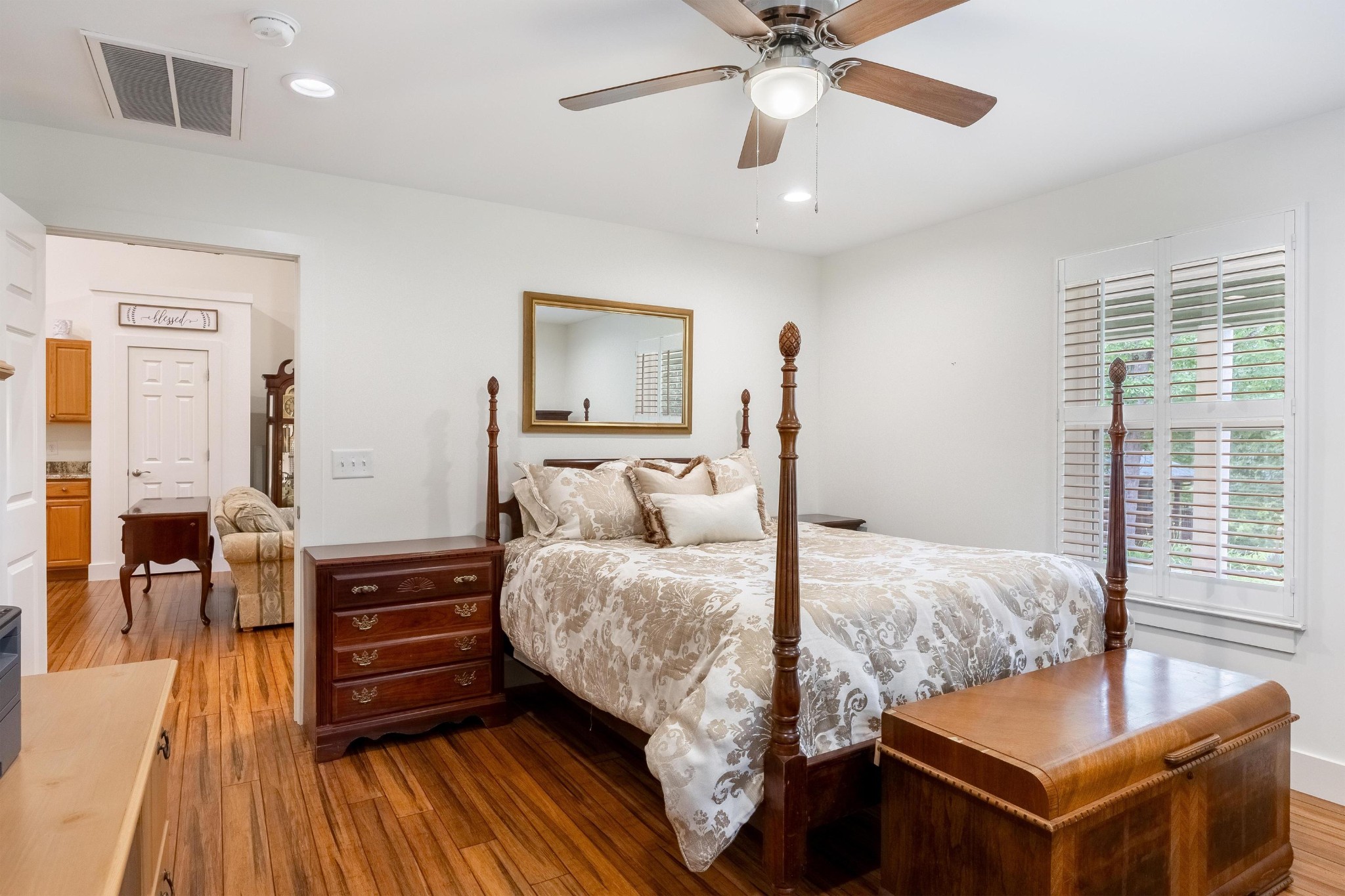 6435 Davis Hill Road Birchwood, TN 37308 - Photo 50 of 64 a bedroom with a bed and a chandelier