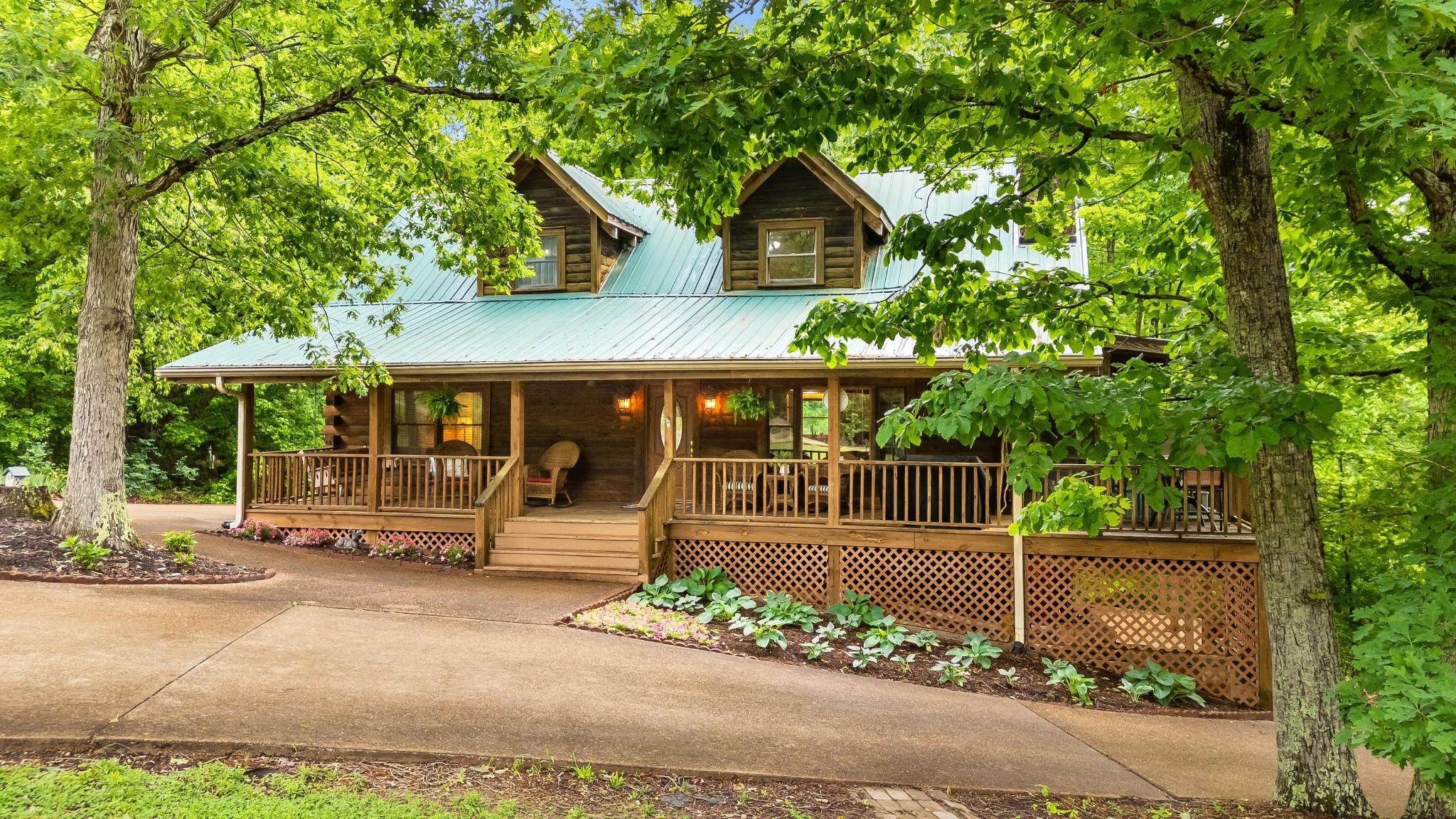 6435 Davis Hill Road Birchwood, TN 37308 - Photo 53 of 64 a front view of a house with a garden