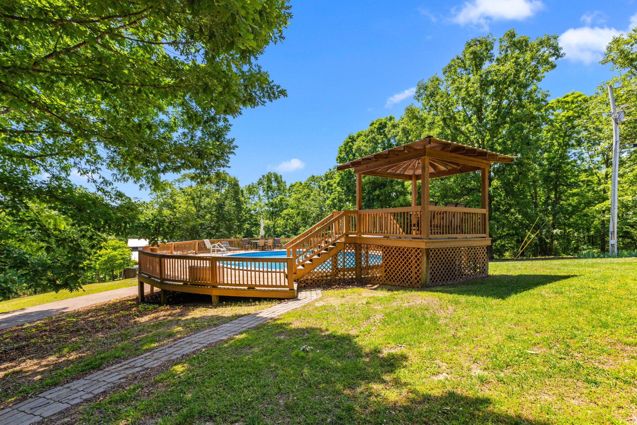 6435 Davis Hill Road Birchwood, TN 37308 - Photo 54 of 64 a view of a wooden deck with a yard
