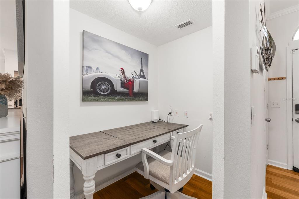 10000 Southwest 52nd Avenue, Unit 35 Gainesville, FL 32608 - Photo 13 of 36 a living room with a table and chairs