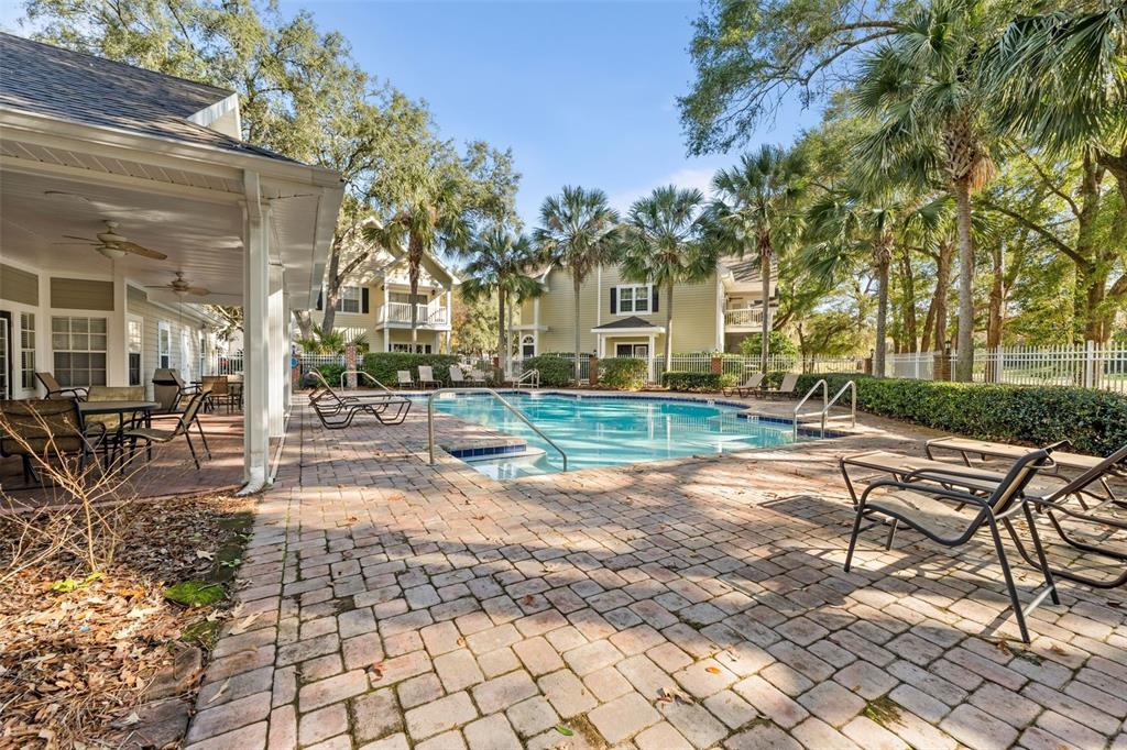 10000 Southwest 52nd Avenue, Unit 35 Gainesville, FL 32608 - Photo 33 of 36 a view of a house with backyard and sitting area