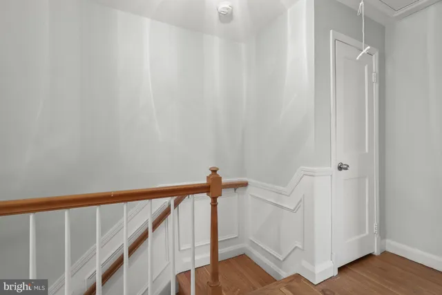 a view of entryway with wooden floor