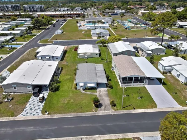 an aerial view of a house with a garden