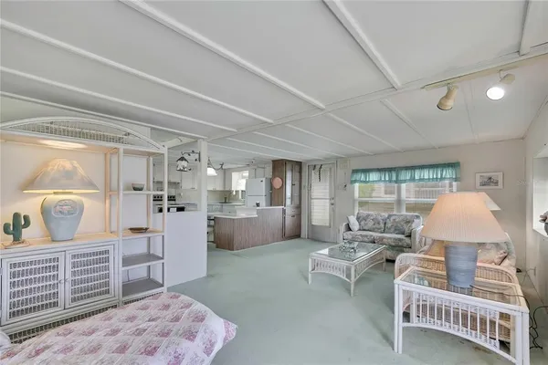 a living room with furniture and a table