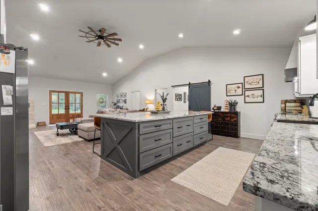 a room with a bed and furniture