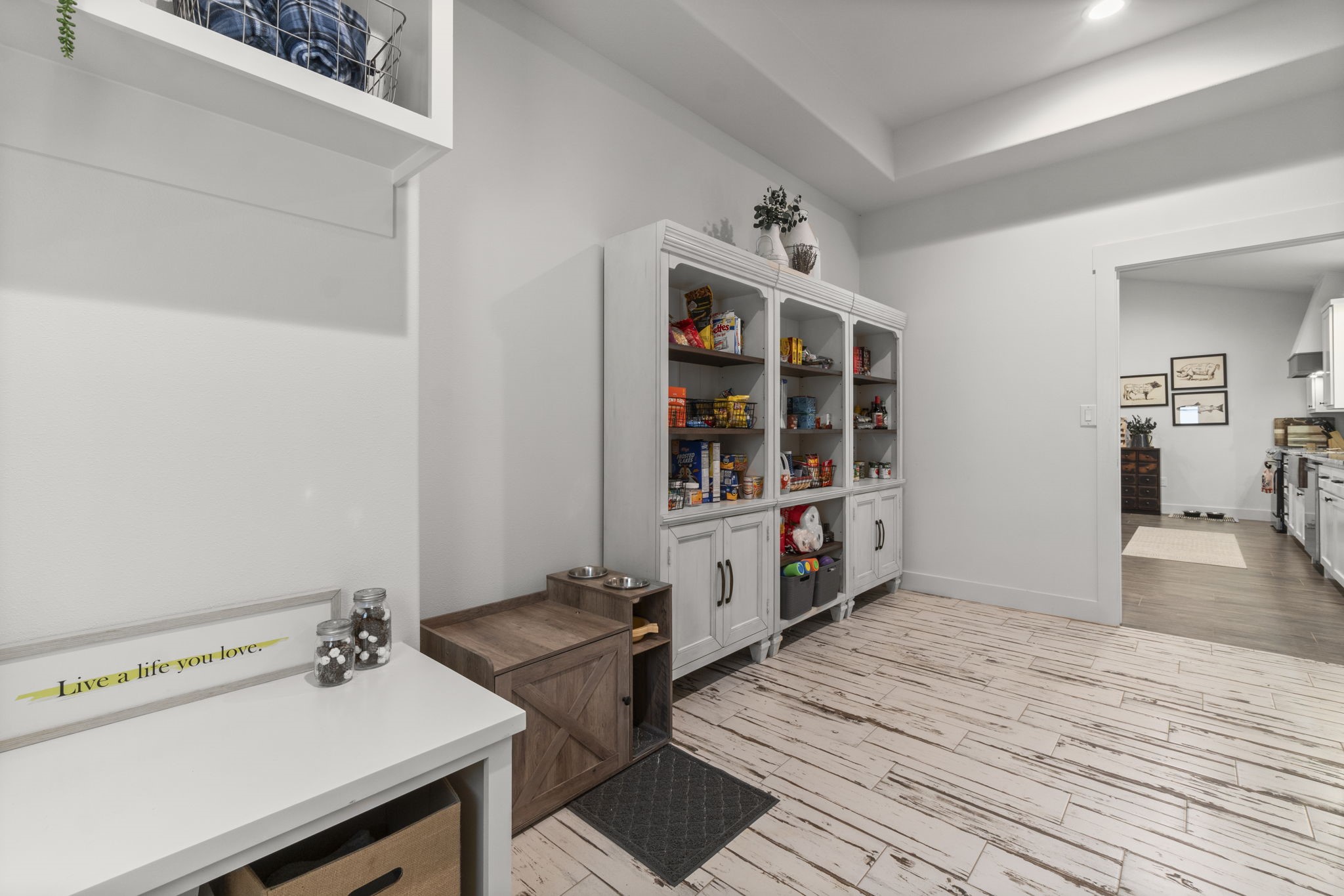 15651 Ben Wiggins Road Conroe, TX 77303 - Photo 17 of 47 a hallway with a wooden floor and breakfast area