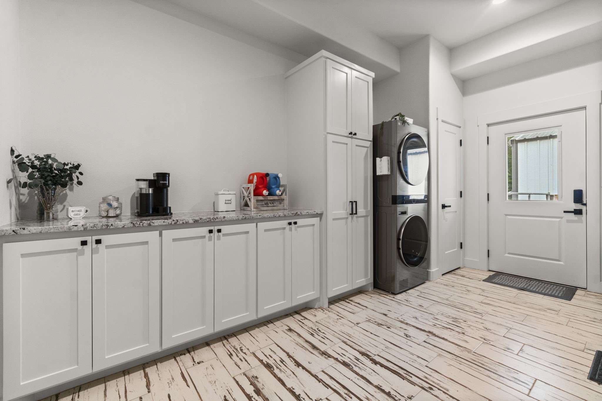 15651 Ben Wiggins Road Conroe, TX 77303 - Photo 18 of 47 a kitchen with a sink and a refrigerator