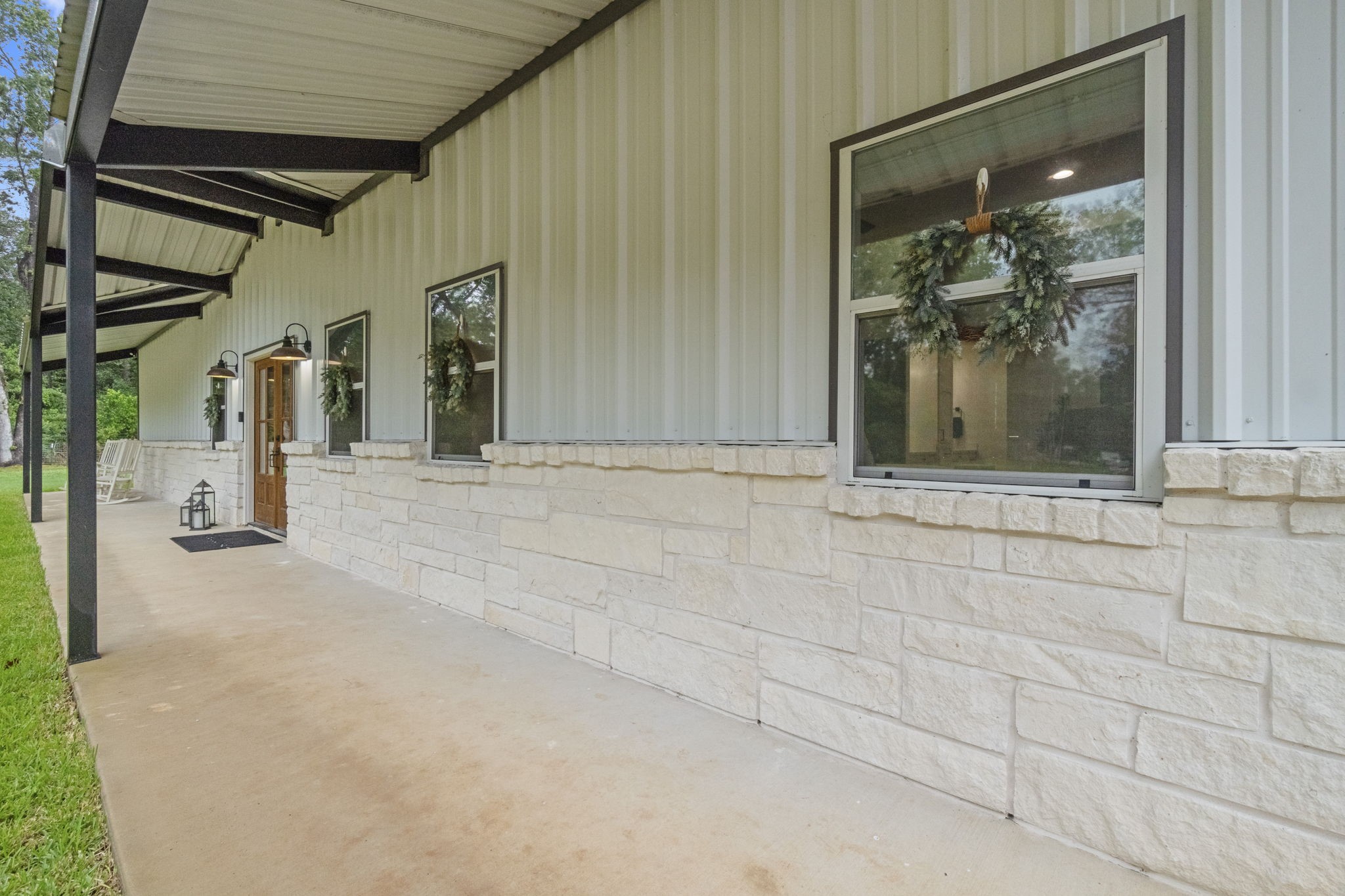 15651 Ben Wiggins Road Conroe, TX 77303 - Photo 3 of 47 a view of entrance gate of the house