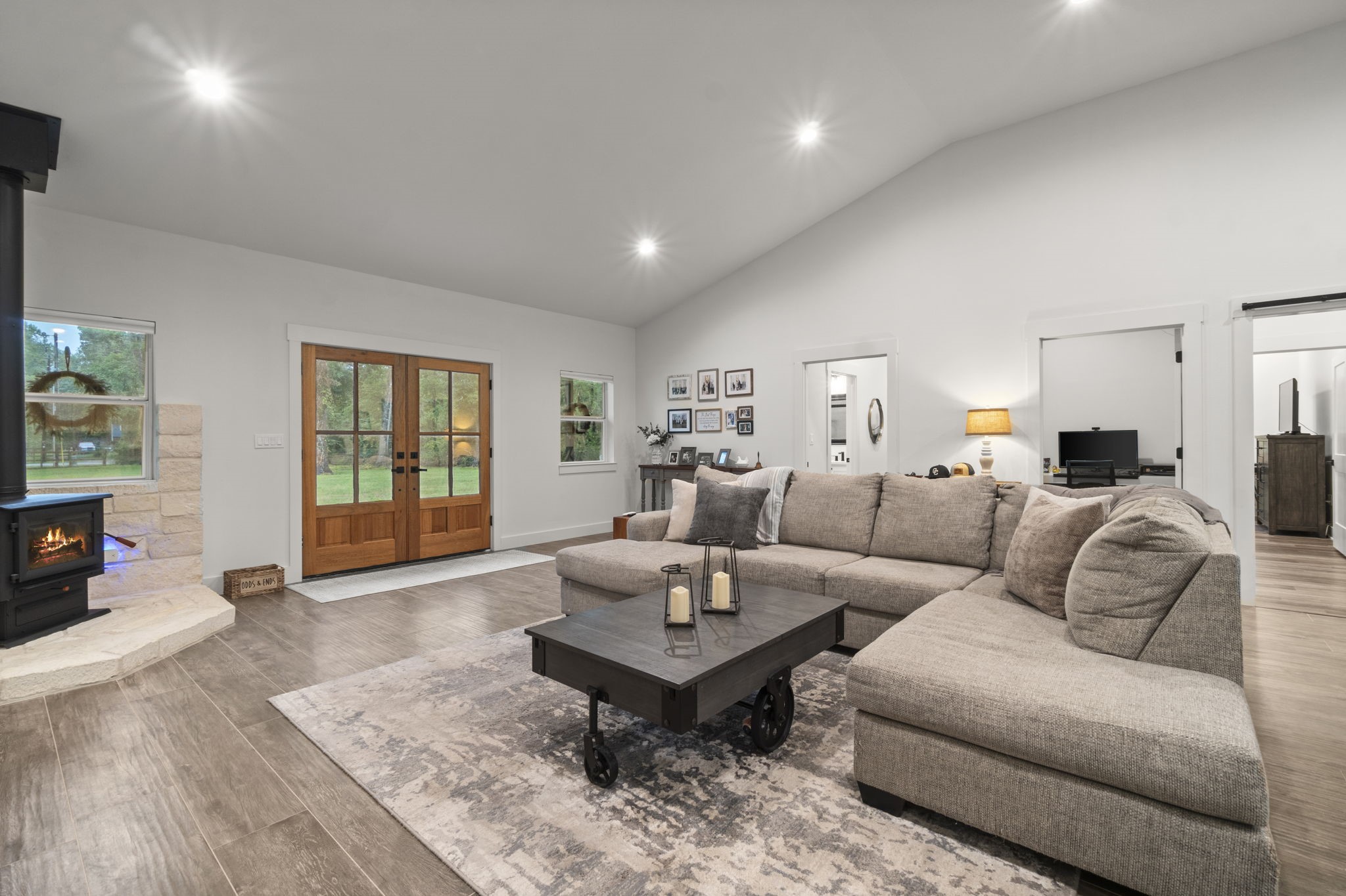 15651 Ben Wiggins Road Conroe, TX 77303 - Photo 8 of 47 a living room with furniture and a table