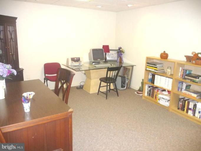 2325 Club Pond Lane Reston, VA 20191 - Photo 14 of 22 a view of a workspace with furniture