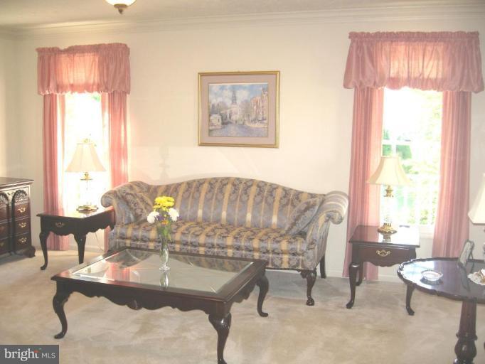 2325 Club Pond Lane Reston, VA 20191 - Photo 22 of 22 a dining room with furniture and a large window