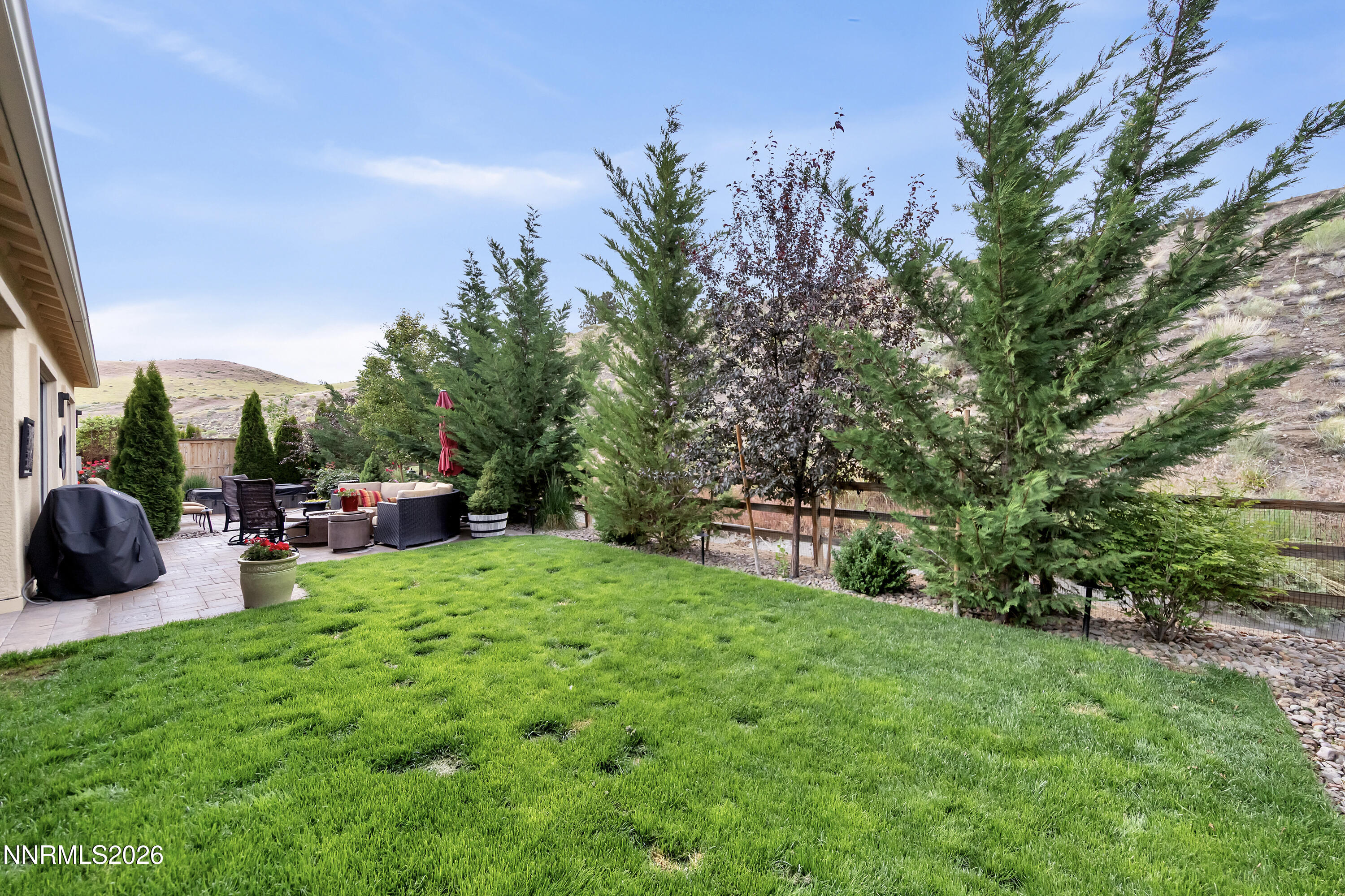 9021 Iron Sky Court Reno, NV 89523 - Photo 36 of 39 a view of a backyard with sitting area