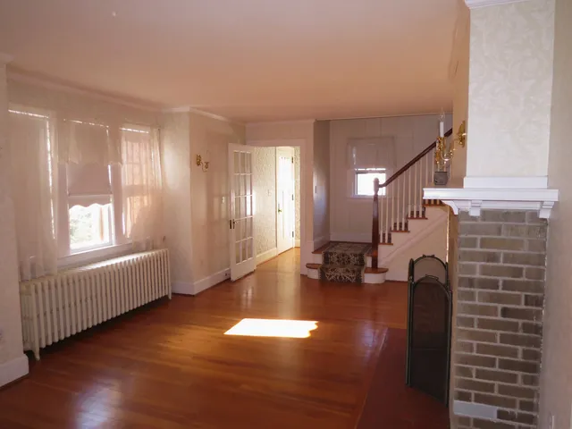 a view of empty room with windows