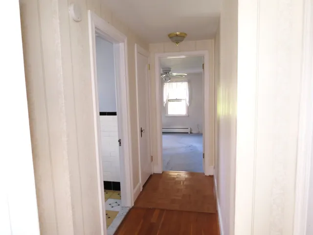 a view of an empty room and window