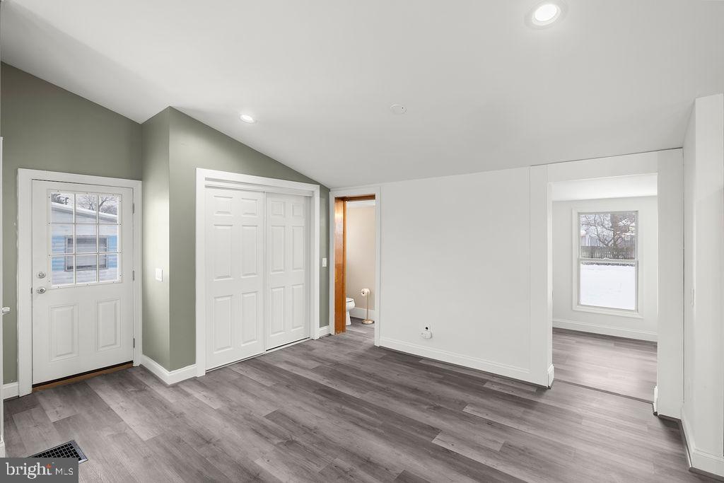 1806 Filbert Street York, PA 17404 - Photo 19 of 33 an empty room with wooden floor and windows
