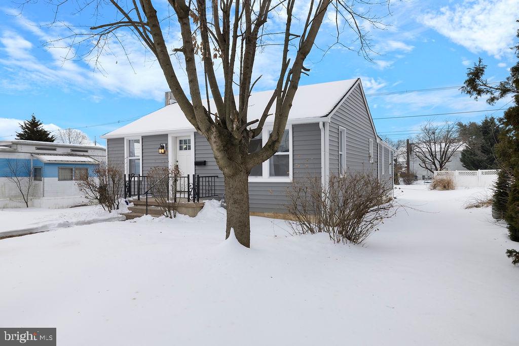 1806 Filbert Street York, PA 17404 - Photo 3 of 33 a view of a house with a snow in the yard