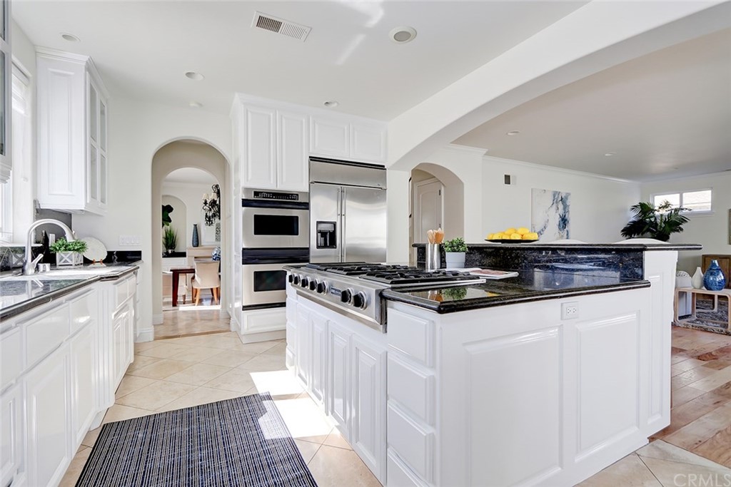 2818 North Ardmore Avenue Manhattan Beach, CA 90266 - Photo 11 of 34 a large kitchen with stainless steel appliances granite countertop a stove and a sink