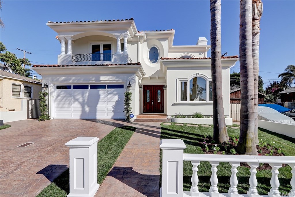 2818 North Ardmore Avenue Manhattan Beach, CA 90266 - Photo 2 of 34 a front view of a house with a garden