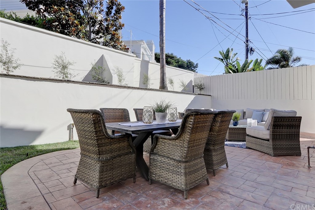 2818 North Ardmore Avenue Manhattan Beach, CA 90266 - Photo 33 of 34 a view of backyard with seating space and wooden fence