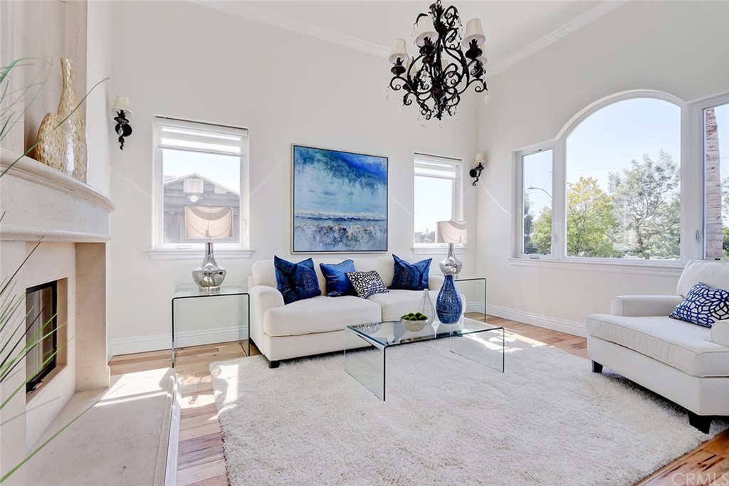 2818 North Ardmore Avenue Manhattan Beach, CA 90266 - Photo 4 of 34 a living room with furniture and a large window