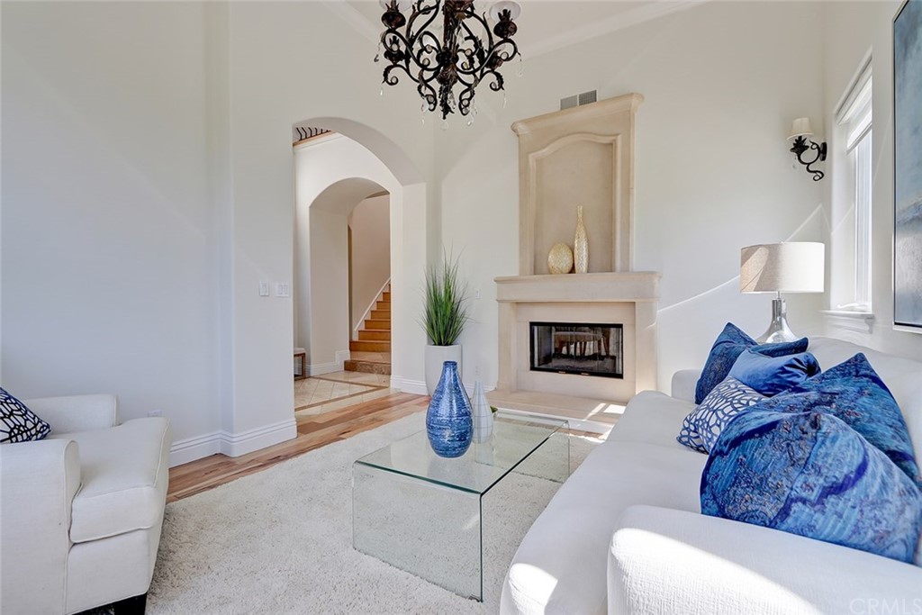 2818 North Ardmore Avenue Manhattan Beach, CA 90266 - Photo 5 of 34 a living room with furniture and a fireplace