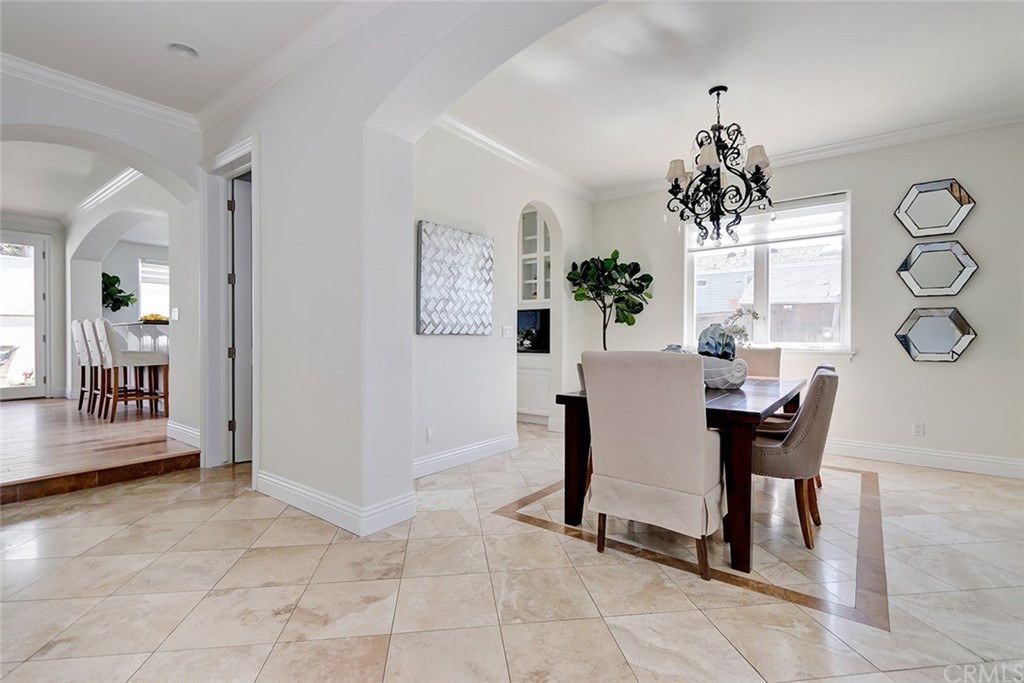 2818 North Ardmore Avenue Manhattan Beach, CA 90266 - Photo 7 of 34 a view of a dining room with furniture and chandelier