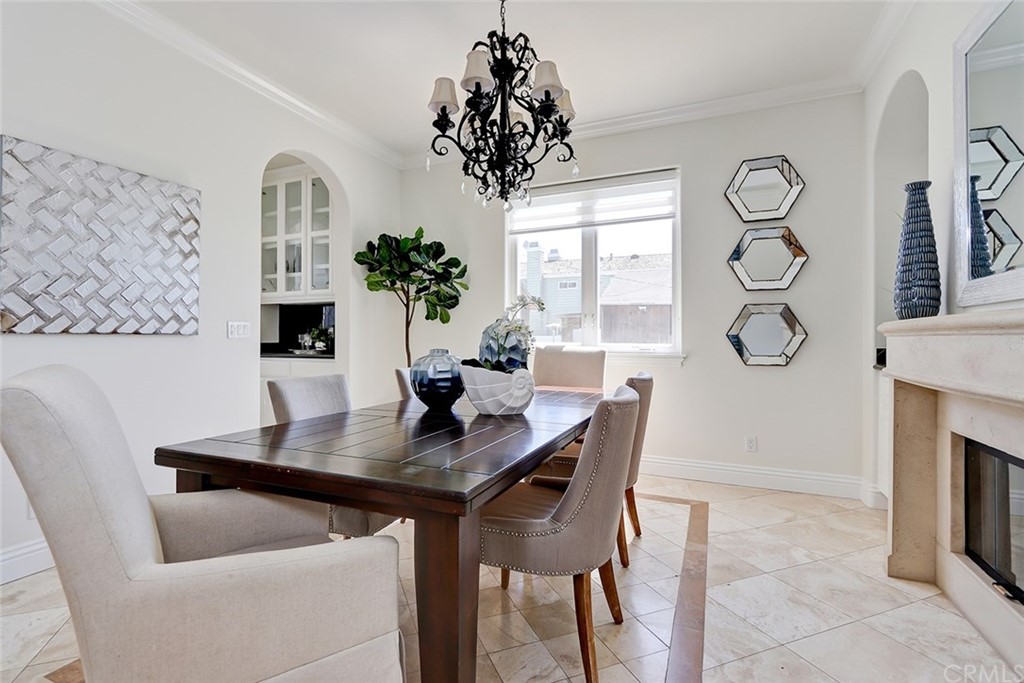 2818 North Ardmore Avenue Manhattan Beach, CA 90266 - Photo 8 of 34 a view of a dining room with furniture and a potted plant