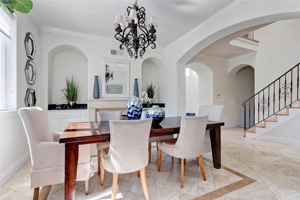2818 North Ardmore Avenue Manhattan Beach, CA 90266 - Photo 9 of 34 a view of a dining room with furniture and a chandelier