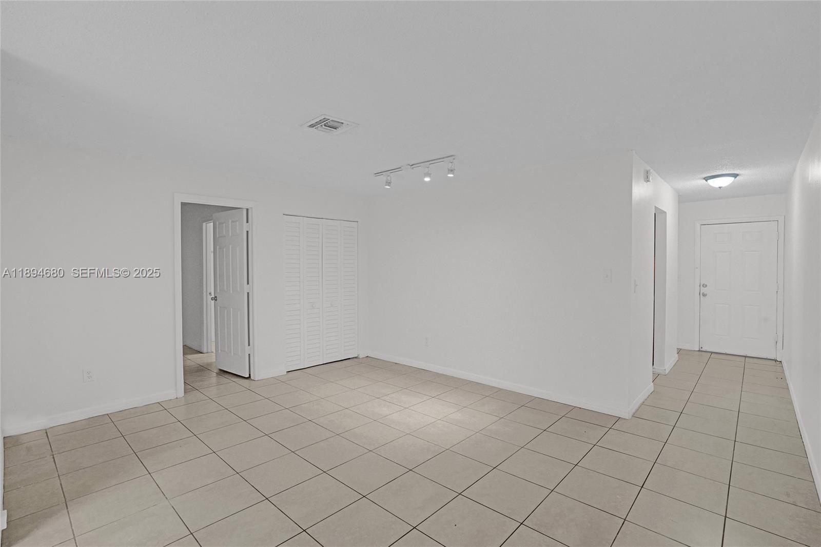 3876 Northwest 207 St Road Miami Gardens, FL 33055 - Photo 12 of 37 a view of an empty room