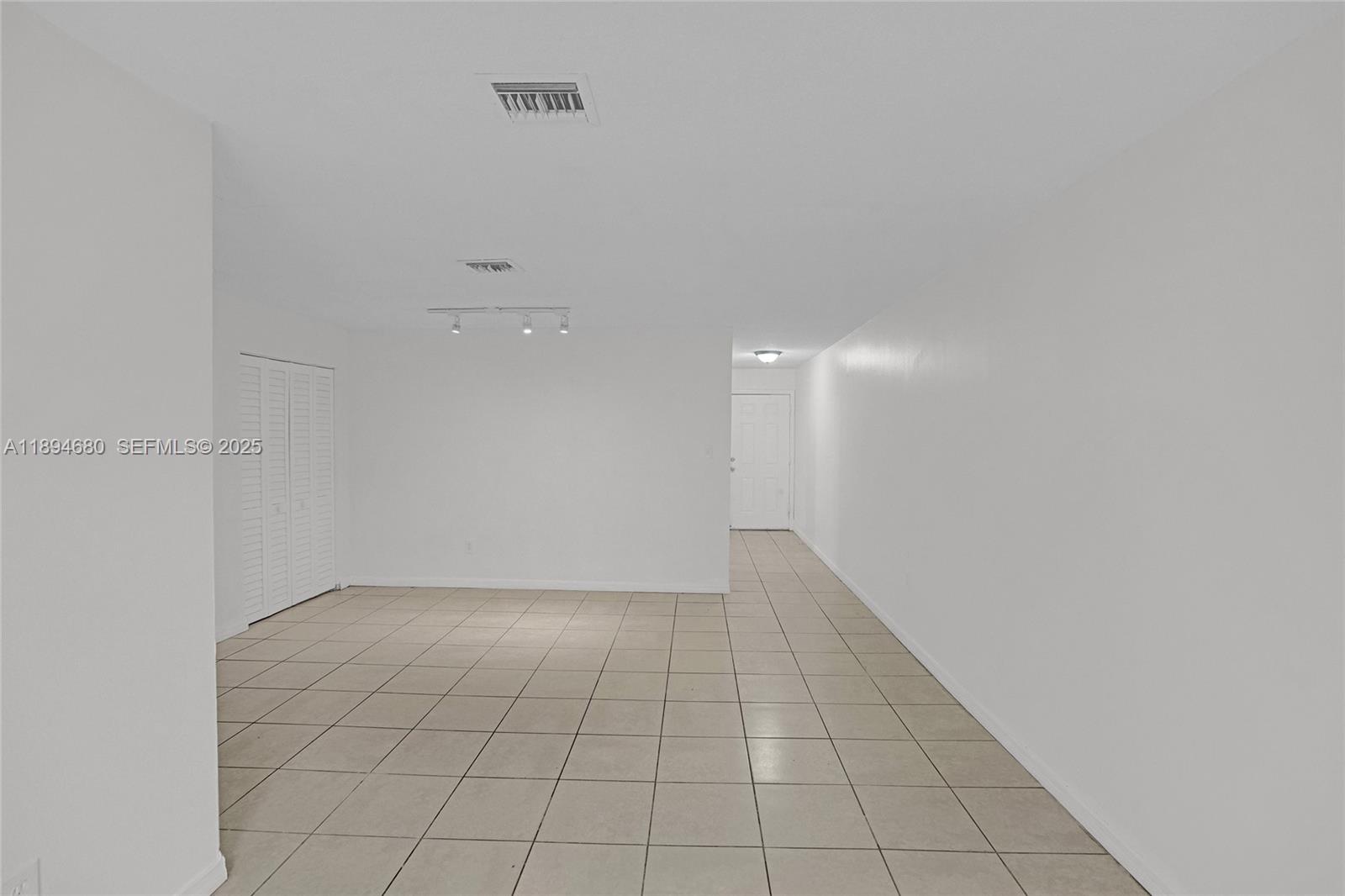 3876 Northwest 207 St Road Miami Gardens, FL 33055 - Photo 13 of 37 a view of an empty room