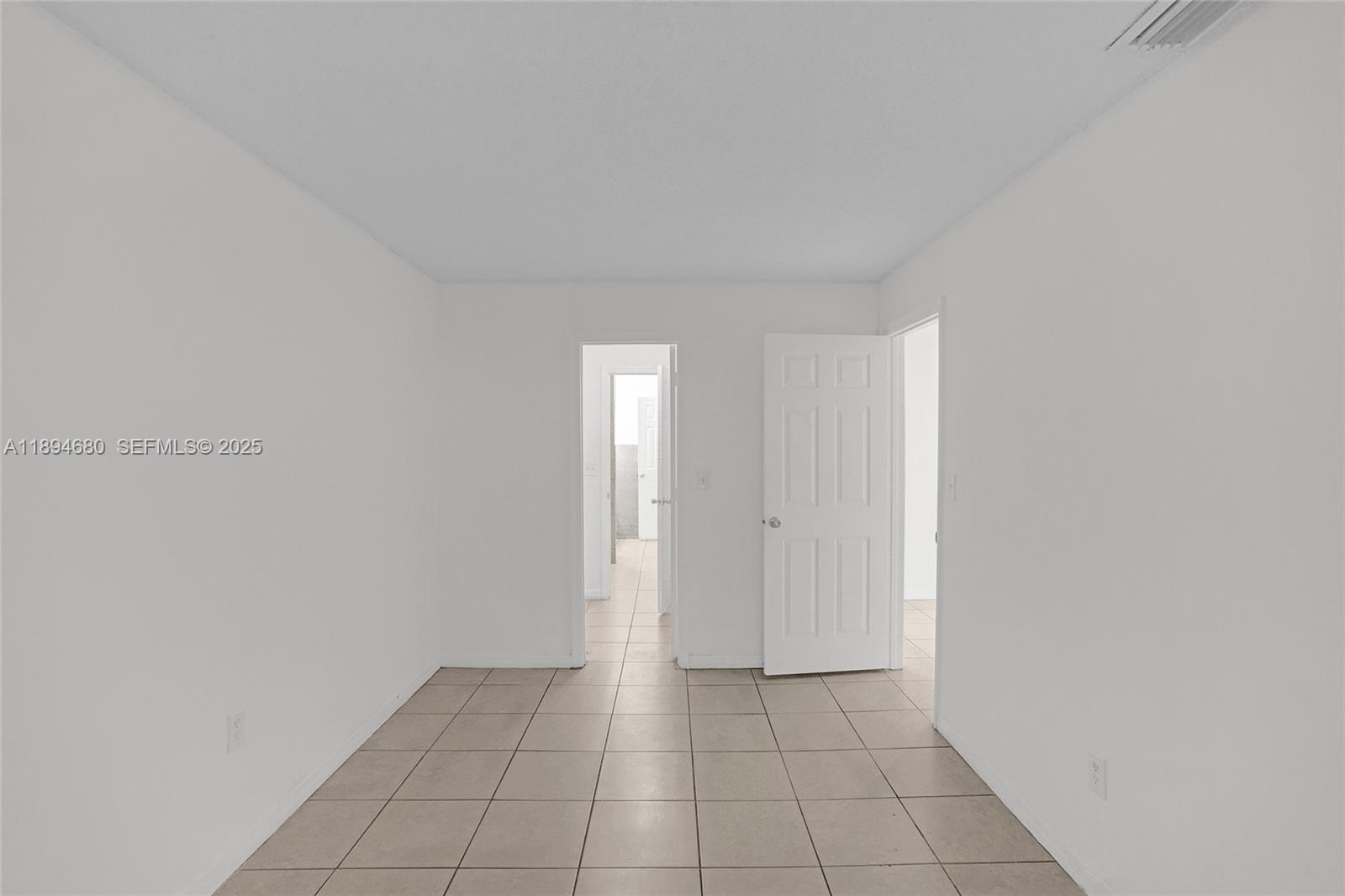 3876 Northwest 207 St Road Miami Gardens, FL 33055 - Photo 16 of 37 a view of an empty room and window