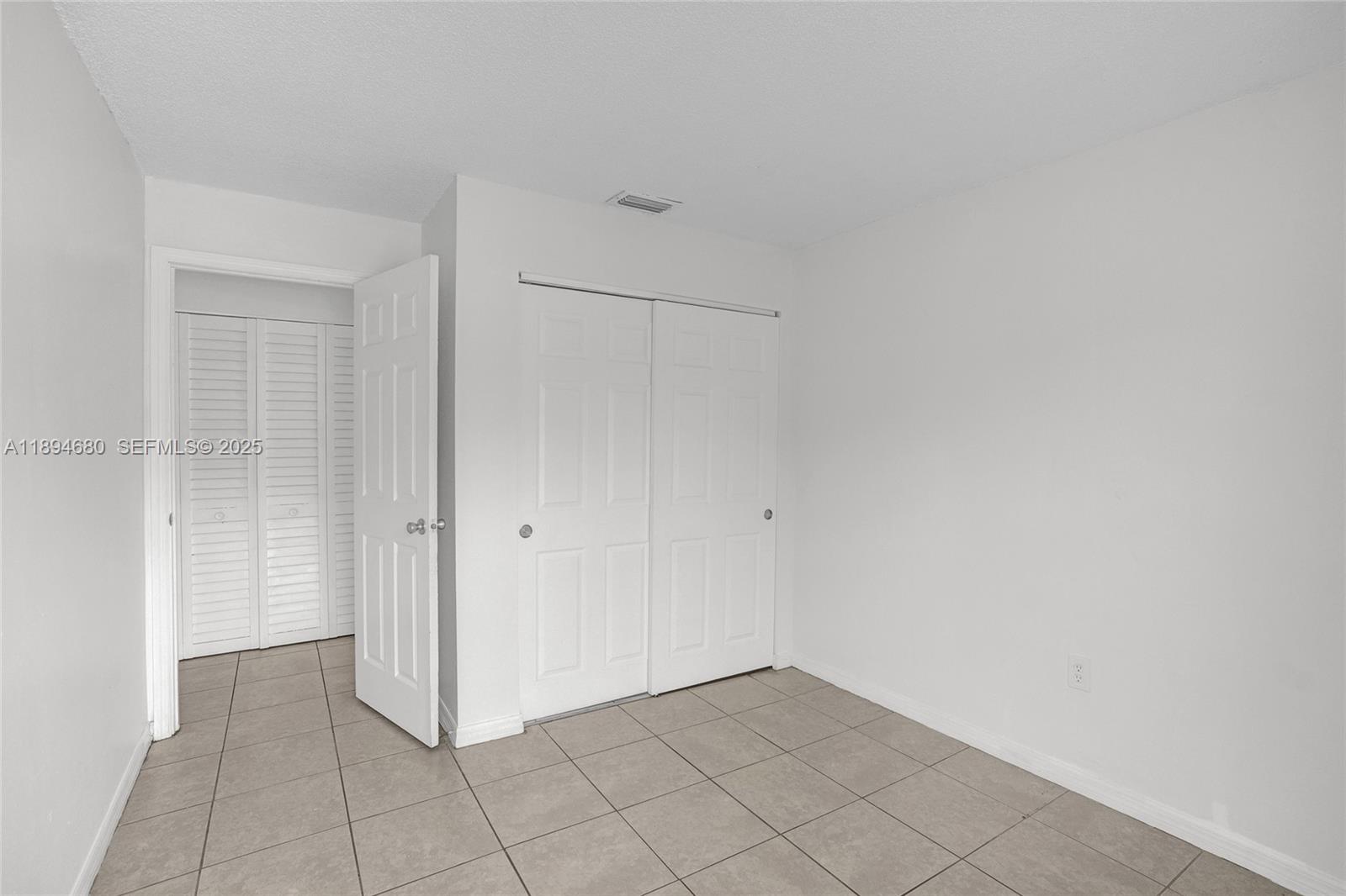 3876 Northwest 207 St Road Miami Gardens, FL 33055 - Photo 23 of 37 a view of an empty room